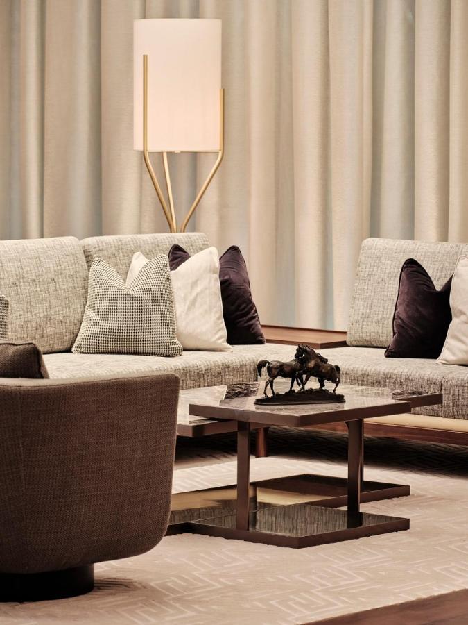 Hotel Grand Hyatt Kuwait Kuwait City Esterno foto A living room with a sofa and a coffee table